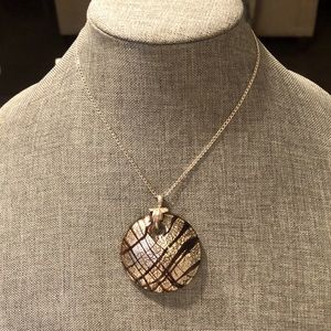 Sterling silver 16” chain with round glass pendant attached with SS leaf bail.